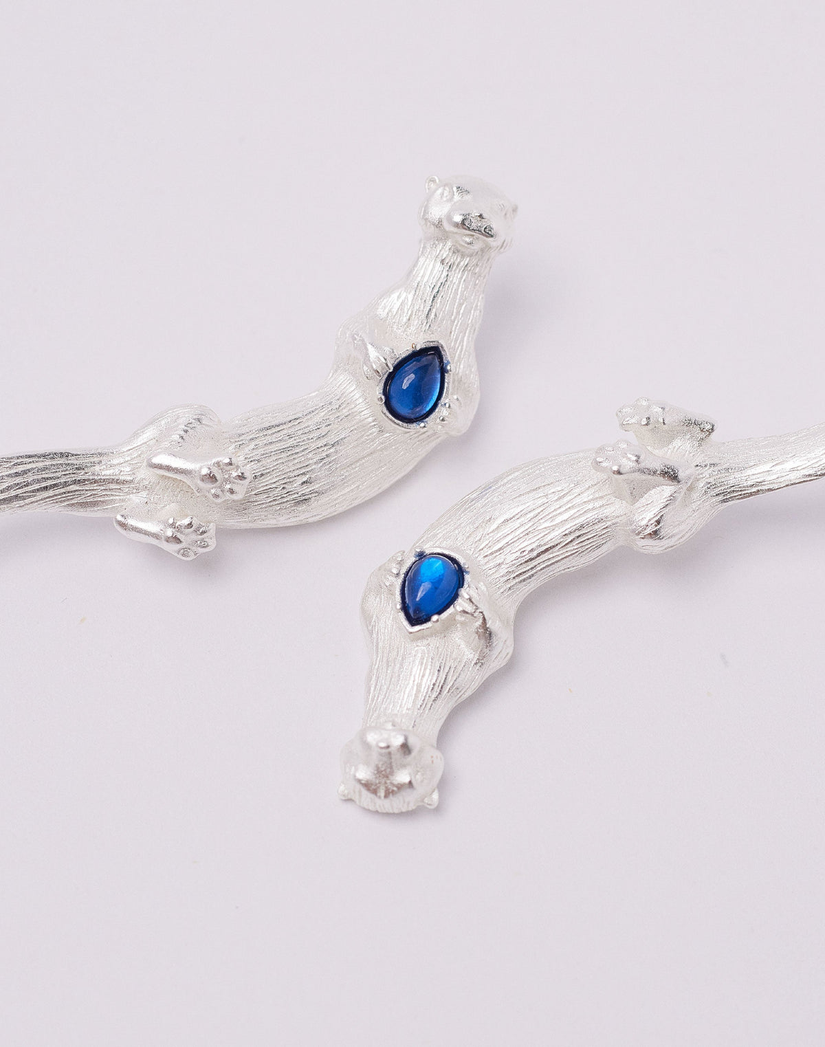 Pendientes Nutria